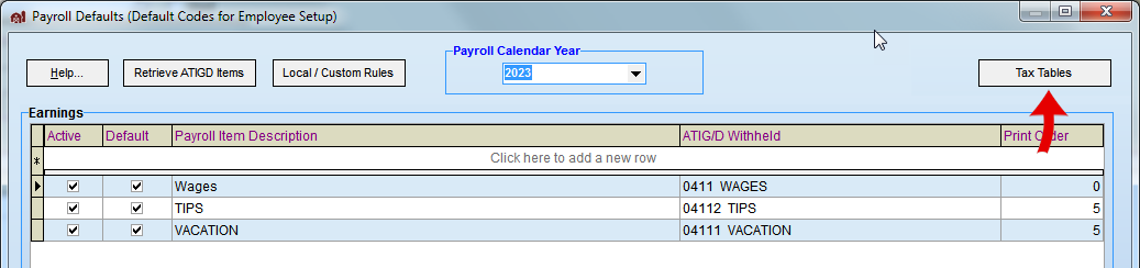 FarmBooks payroll defaults screen with the tax tables button selected